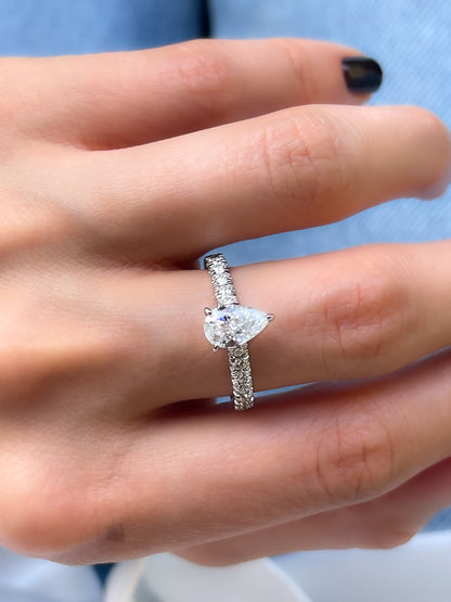 Pear Shaped Moissanite Engagement Ring In Solid Gold