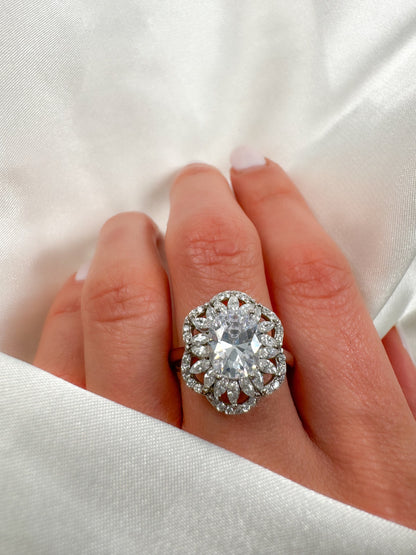 2CT Oval Cut Simulated Diamond Halo Sterling Silver Ring