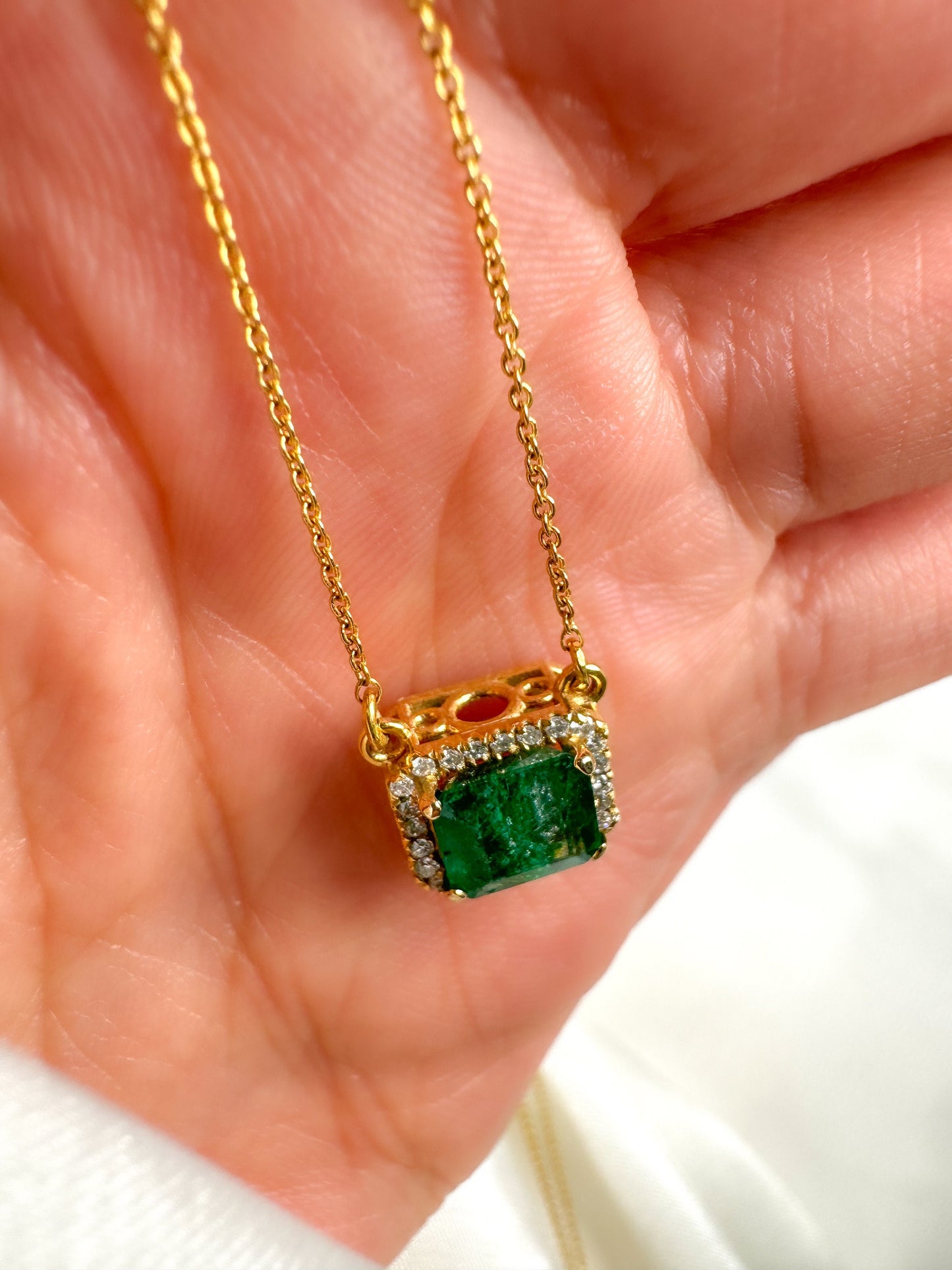 Emerald Cut Emerald Halo Diamond Necklace in 14k Gold