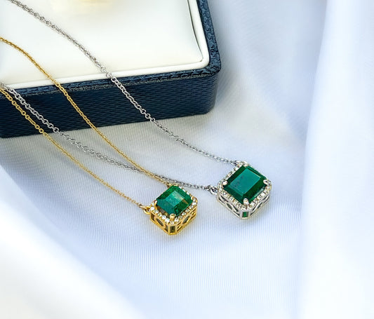 Emerald Cut Emerald Halo Diamond Necklace in 14k Gold